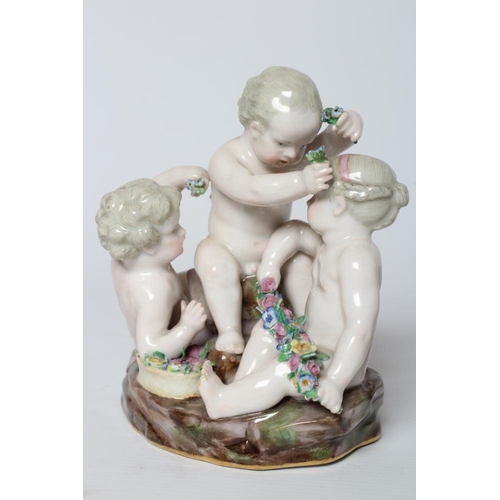 20 - A MEISSEN PORCELAIN FIGURE GROUP, late 19th century, perhaps allegorical of Spring, modelled as thre... 