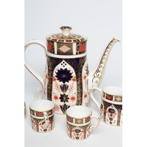 29 - A ROYAL CROWN DERBY CHINA COFFEE SET, modern, painted in the Imari palette with pattern 1128, compri... 