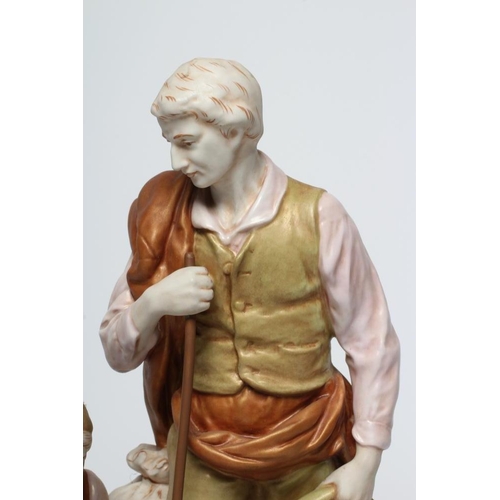 38 - A ROYAL DUX PORCELAIN FIGURE GROUP, mid 20th century, modelled as a young farmer standing beside his... 