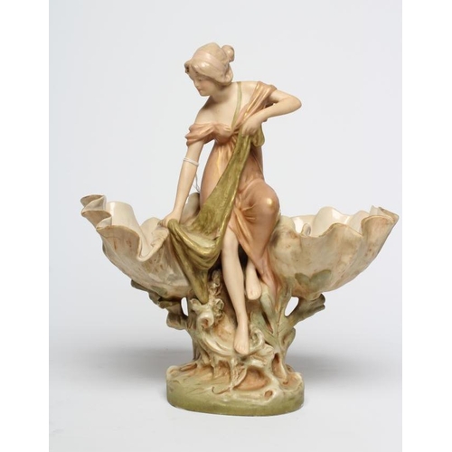 39 - ROYAL DUX PORCELAIN ART NOUVEAU FIGURAL CENTREPIECE modelled as a young maiden standing between a pa... 