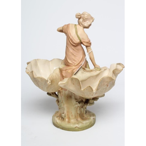 39 - ROYAL DUX PORCELAIN ART NOUVEAU FIGURAL CENTREPIECE modelled as a young maiden standing between a pa... 