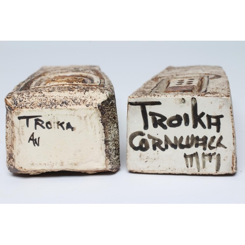 50 - A MATCHED PAIR OF TROIKA POTTERY COFFIN VASES, c.1974/5, one by Marion Murrell incised with a stylis... 