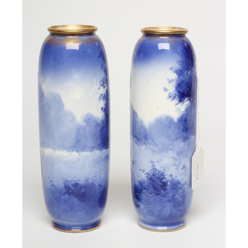 54 - A PAIR OF ROYAL DOULTON 'BLUE CHILDREN' VASES, early 20th century, of rounded cylindrical form, gree... 