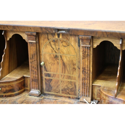 619 - A GEORGIAN MAHOGANY BUREAU, third quarter 18th century, the fallfront enclosing a stepped and waved ... 