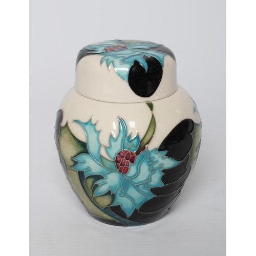 62 - A MOORCROFT POTTERY SEA HOLLY PATTERN JAR AND COVER, 2014, designed by Emma Bossons, impressed marks... 