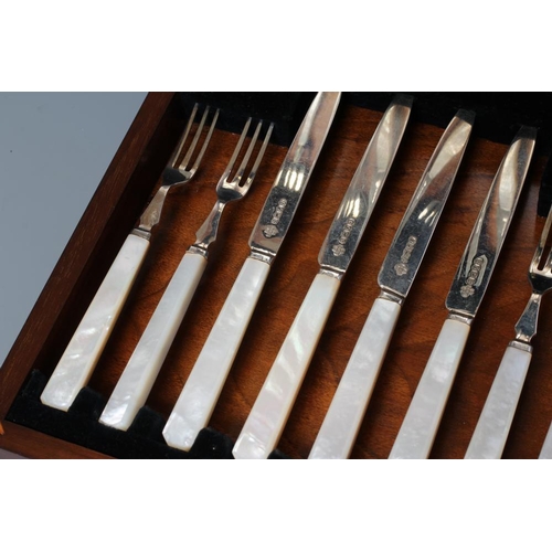 91 - A SET OF EIGHT PAIRS OF SILVER FRUIT KNIVES AND FORKS, by Zaccariah Barraclough & Sons Ltd., Sheffie... 