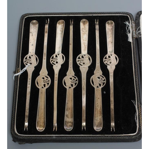 93 - A SET OF SEVEN SILVER LOBSTER PICKS, by Frank Cobb, Sheffield 1928, of typical form centrally pierce... 