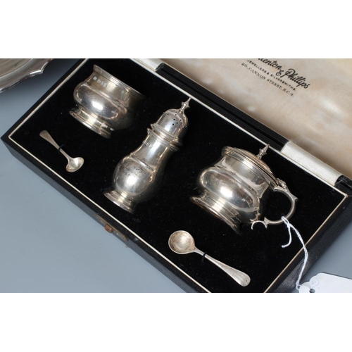 99 - A SILVER THREE PIECE CRUET, by Hicklenton & Phillips, London 1935, of girdled baluster form, compris... 