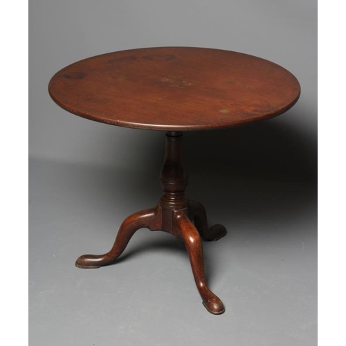 628 - A GEORGIAN MAHOGANY TRIPOD TABLE, third quarter 18th century, the circular top with bird cage action... 