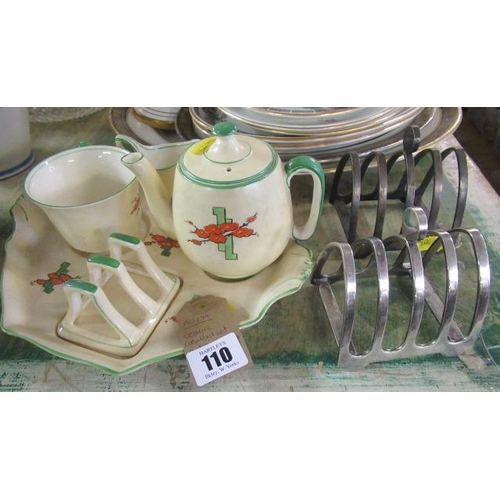 110 - ART DECO POTTERY SOLITAIRE AND TWO EPNS TOAST RACKS
