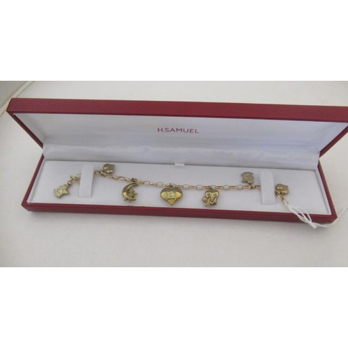 183 - 9CT GOLD CHARM BRACELET