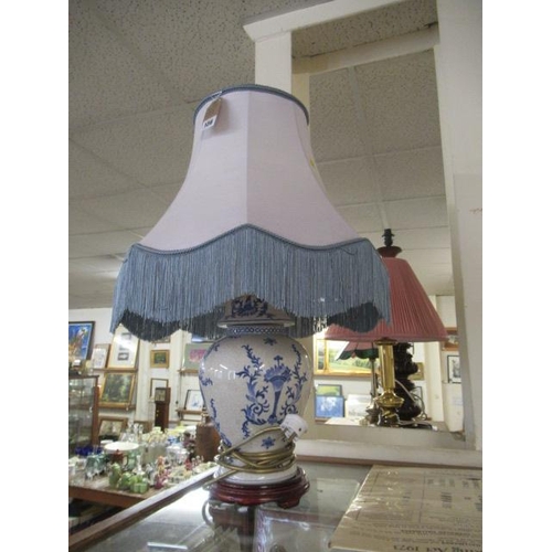 136 - BLUE AND WHITE CERAMIC TABLE LAMP AND SHADE