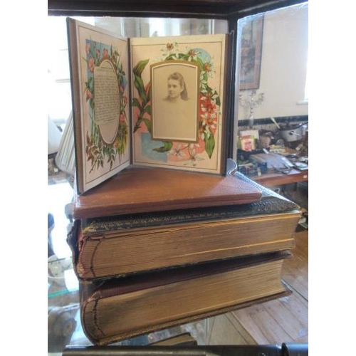 352 - TWO VICTORIAN PHOTO ALBUMS AND TWO FOLDING LEATHER FRAMES