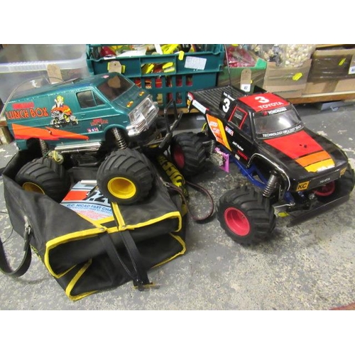 29 - TWO REMOTE CONTROL MONSTER TRUCKS