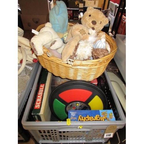 110 - CRATE OF GAMES AND BASKET OF SOFT TOYS