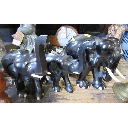 21 - THREE CARVED ELEPHANTS