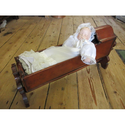 41 - VICTORIAN MAHOGANY DOLLS CRIB AND DOLL