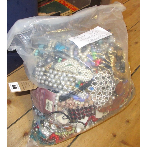 69 - LARGE BAG OF COSTUME JEWELLERY