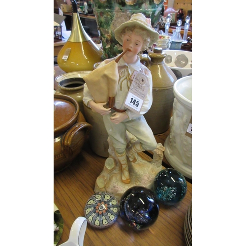 145 - LARGE BISQUE PIPER FIGURE AND THREE GLASS PAPERWEIGHTS INCLUDING MILLEFIORI