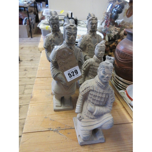 529 - FIVE STONEWARE CHINESE WARRIOR ORNAMENTS