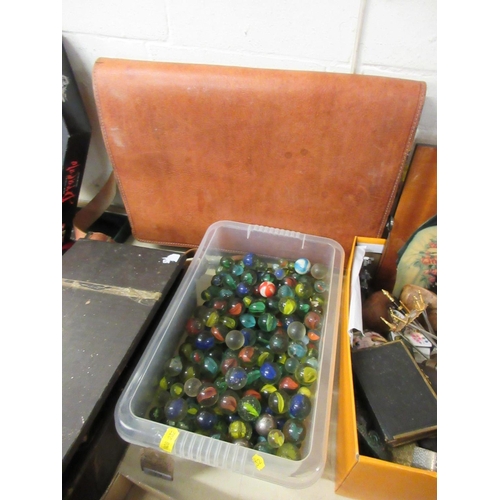 17 - BOX OF MARBLES AND LEATHER BAG