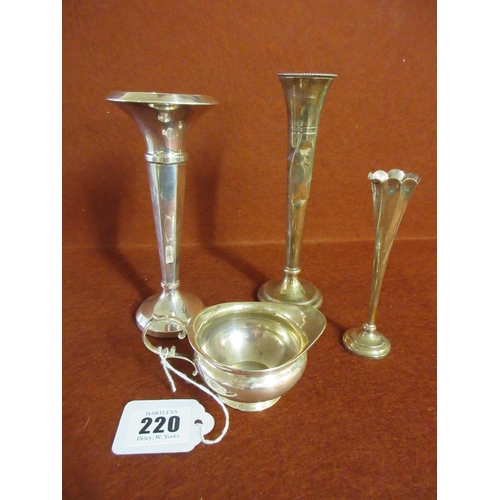 220 - THREE SILVER STEM VASES AND A CREAM JUG