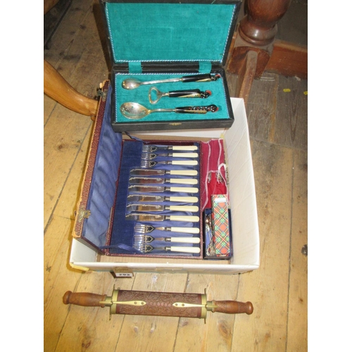 293 - BOX OF CUTLERY INCLUDING CARVING KNIFE AND FORK SET ON STAND