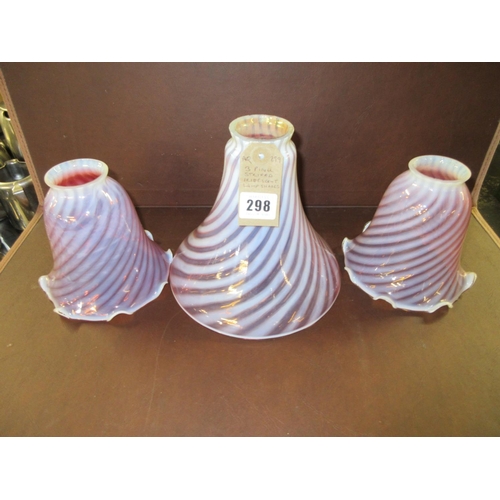 298 - THREE PINK STRIPED IRIDESCENT GLASS SHADES