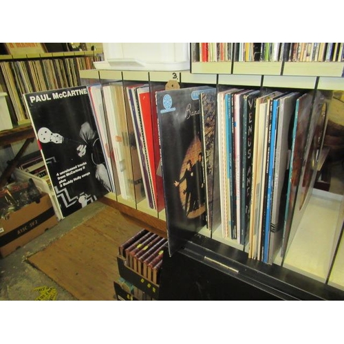 392 - STORAGE SHELF OF PAUL MCCARTNEY AND WINGS LP RECORDS