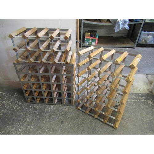 583 - THREE WINE RACKS