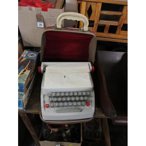 31 - CASED VINTAGE SMALL TYPEWRITER