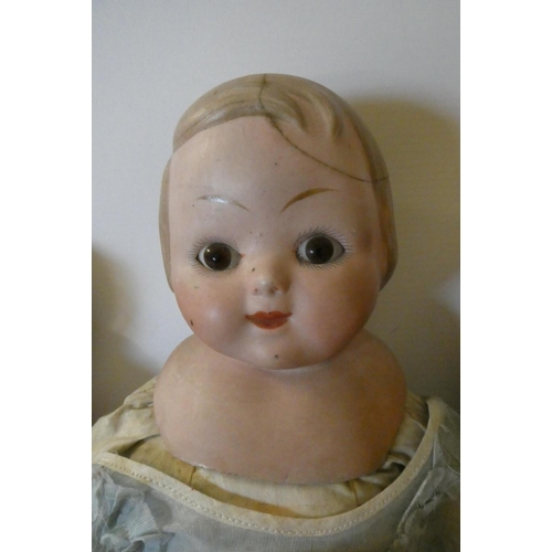 100 - Four vintage dolls, comprising a 16