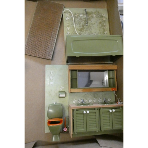 103 - Four small boxes of doll's house furniture and accessories, including vintage wooden, metal and upho... 