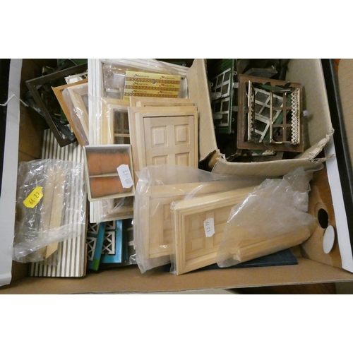 104 - Three boxes of doll's house building items, including vintage metal windows and doors, modern wooden... 