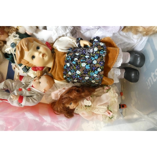 113 - A box of small collectors dolls including a Hummel style doll and all bisque examples (Est. plus 24%... 