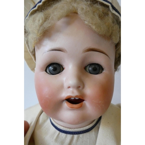 118 - A Max Handwerck Bebe Elite bisque socket head sailor doll with blue glass sleeping eyes, open mouth,... 