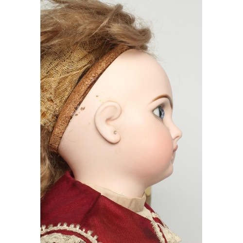 131 - A Tete Jumeau bisque socket head doll, with blue glass fixed eyes, closed mouth, pierced ears, blond... 