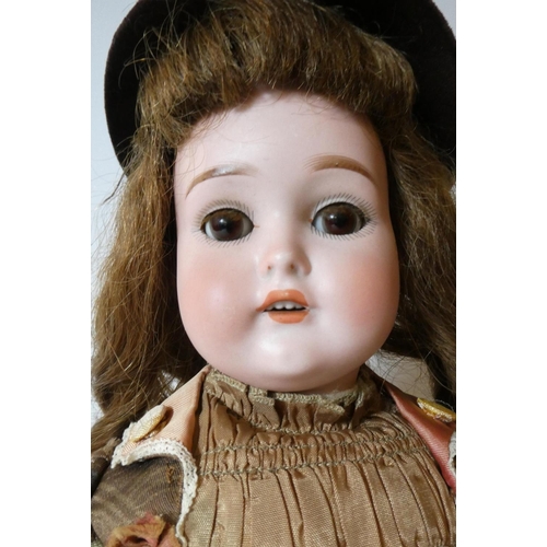 132 - A Gans & Seyfarth bisque socket head doll, with brown glass sleeping eyes, auburn wig, open mouth, t... 