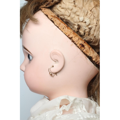 133 - A Bebe Jumeau bisque socket head doll, 1890, with blue glass paperweight fixed eyes, closed mouth, p... 