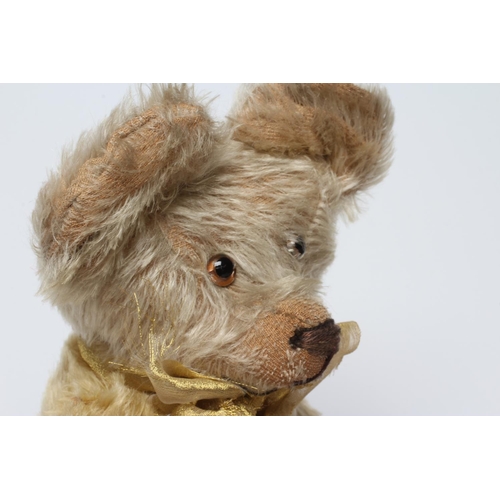 146 - Blond mohair jointed teddy bear, c.1920, with clear glass eyes, sewn nose, large ears and cloth pads... 