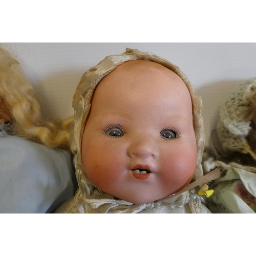 16 - Four vintage dolls, comprising a 12 1/2