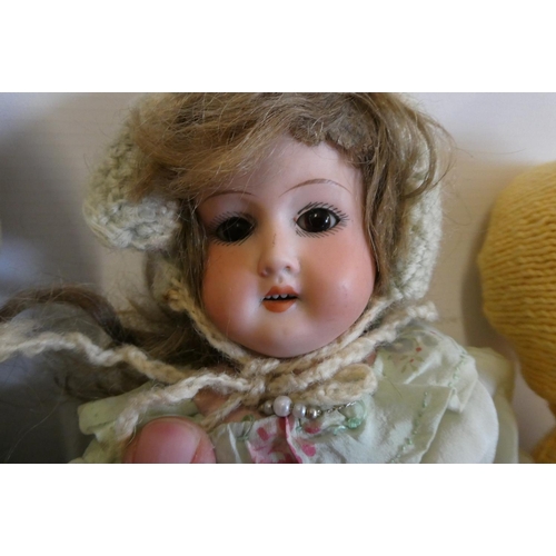 16 - Four vintage dolls, comprising a 12 1/2