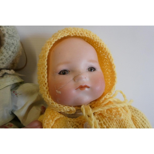 16 - Four vintage dolls, comprising a 12 1/2