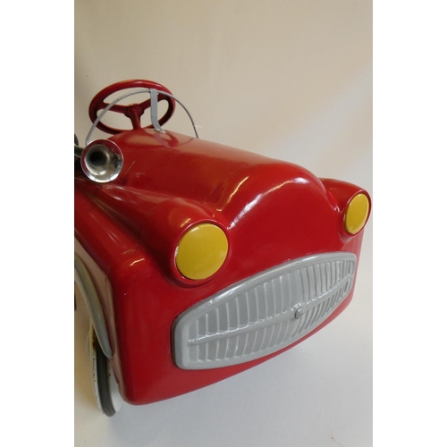 172 - A Mobo pedal car, 1950s, with painted metal body, manual horn and wire windshield, 36