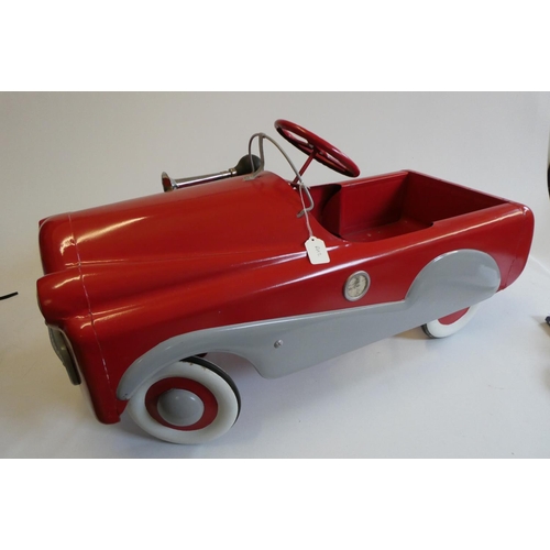 172 - A Mobo pedal car, 1950s, with painted metal body, manual horn and wire windshield, 36