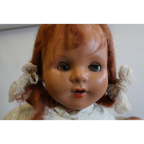 20 - Four vintage dolls, comprising a 23