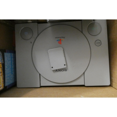 212 - Playstation with controllers and 28 boxed games, including Tomb Raider, Tomb Raider II and III, Tony... 