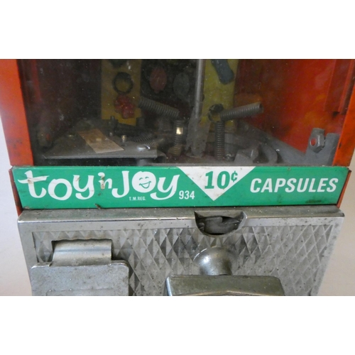 213 - Toy 'n Joy tin plate vending/gum ball machine, reg. 934, 10c pricing, some rust, unable to test func... 