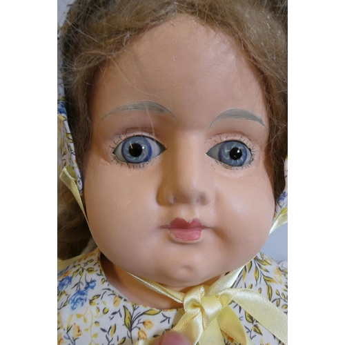 22 - Two vintage dolls, comprising a 27