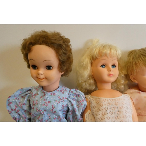 24 - Four vintage vinyl dolls, comprising a 30